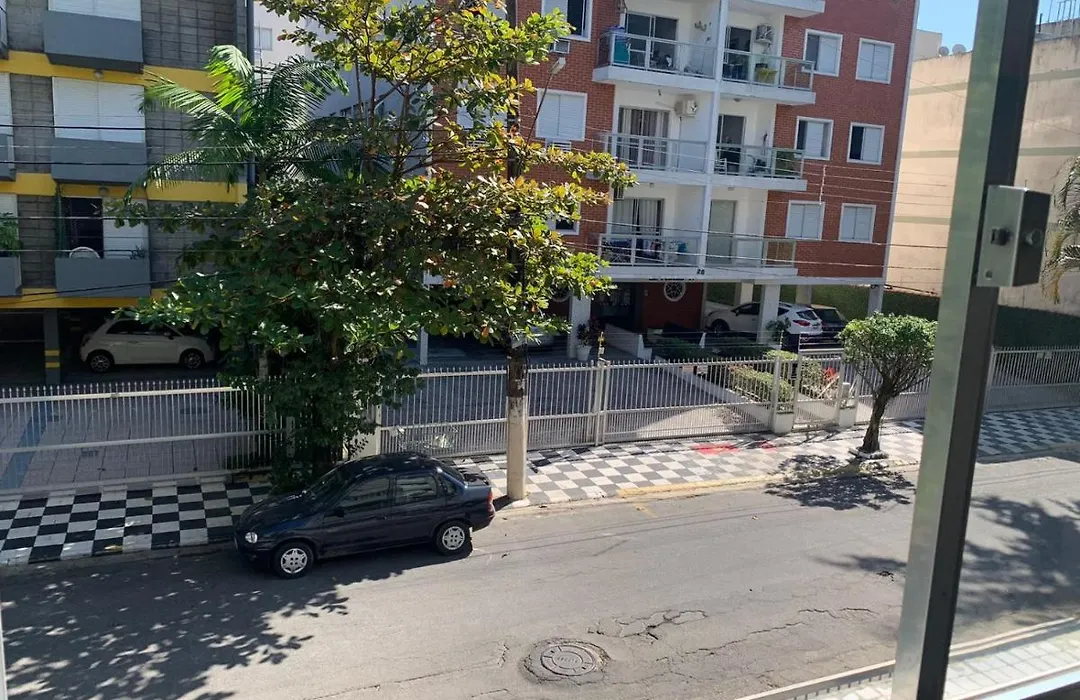 Apartamento Praia das Astúrias, 2 minutos de caminhada para praia, piscina, garagem demarcada-1