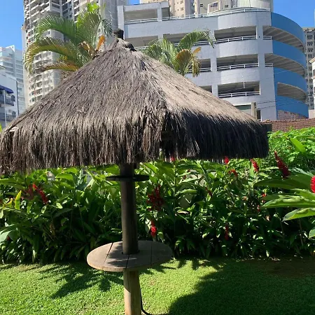 Apartamento Praia das Astúrias, 2 minutos de caminhada para praia, piscina, garagem demarcada-3